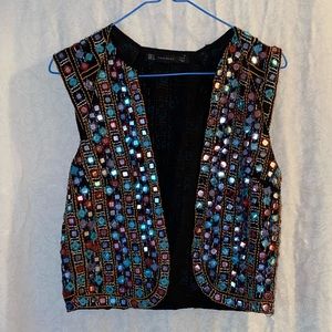 Unique multi color vest. Size Small